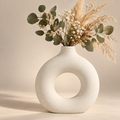 Forma white ceramic donut vase with dried flowers